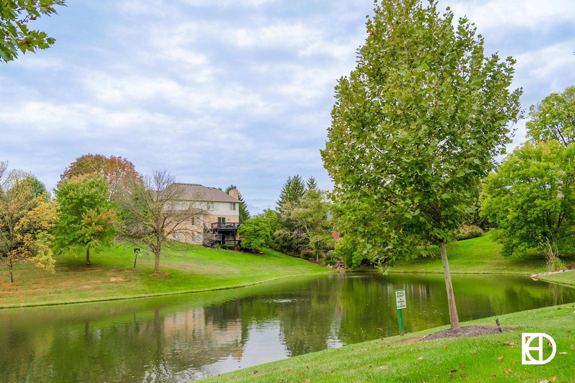 Photo of pond and greenspace in Fox Hollow neighborhood in Zionsville, Indiana.
