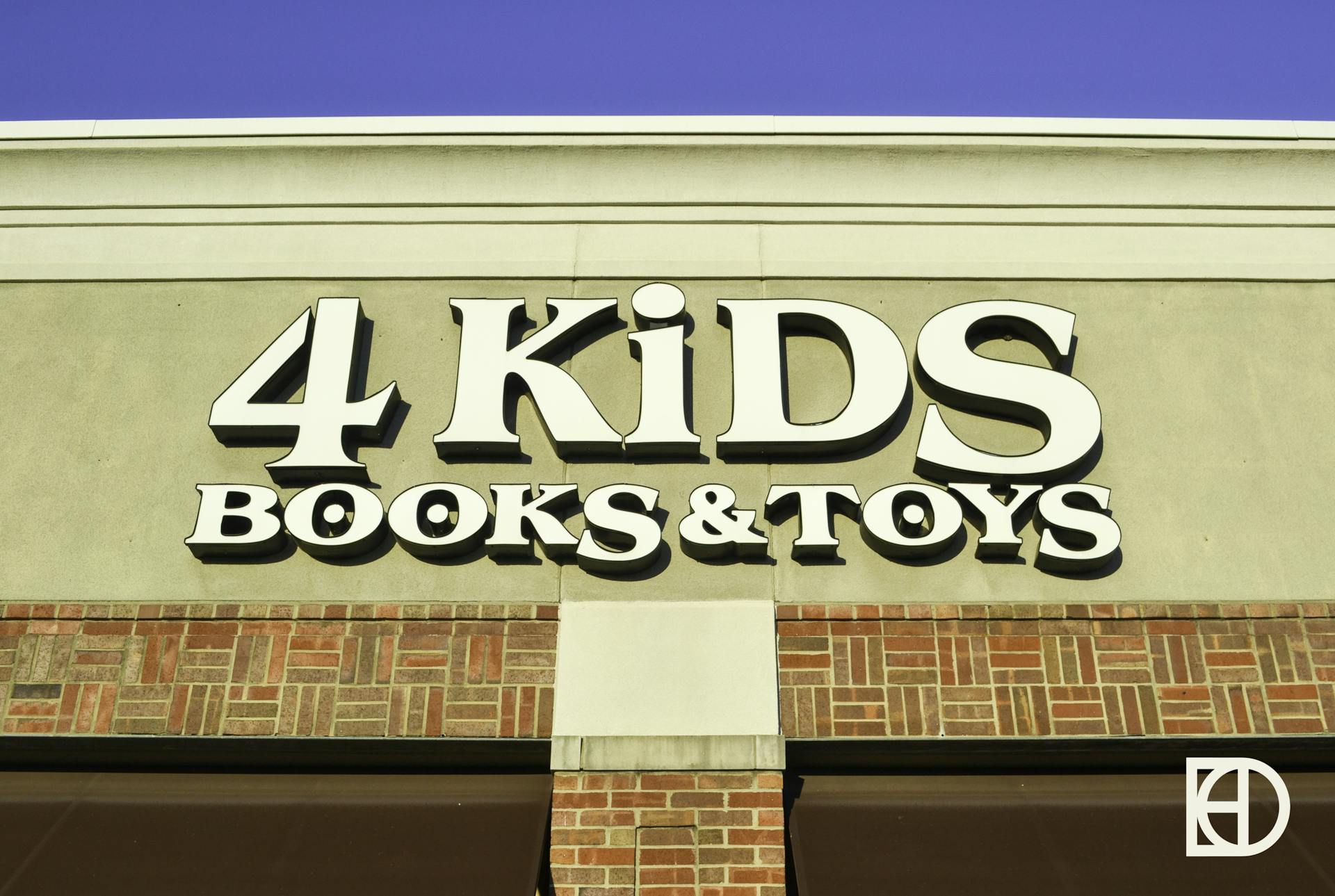 Exterior photo of 4 Kids Books & Toys, showing signage