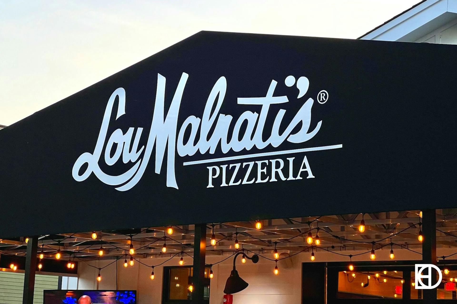 Exterior photo of signage at Lou Malnati's Pizzeria in Broad Ripple