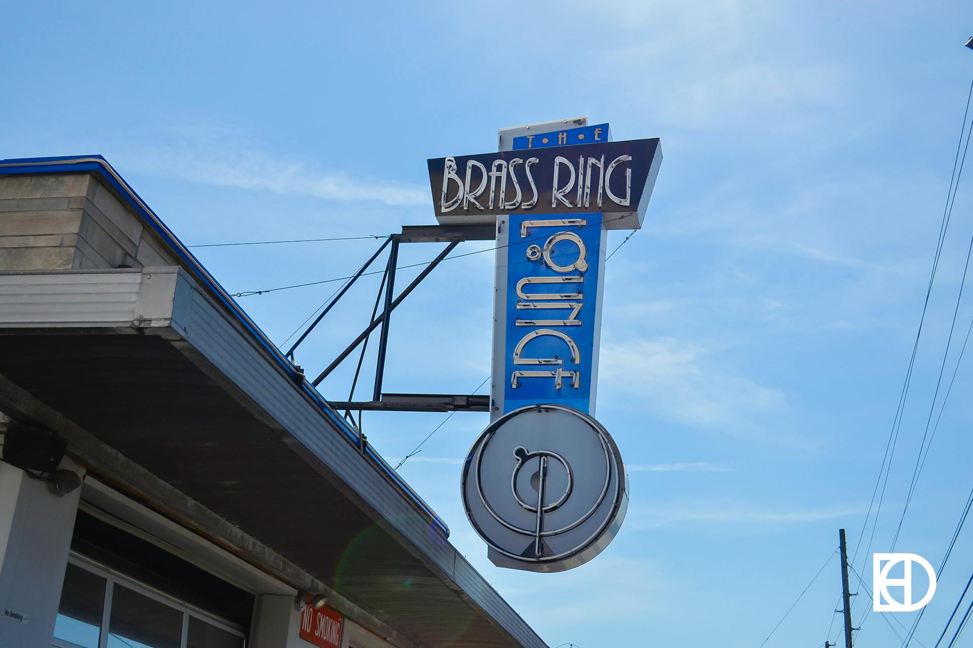 Photo of the exterior signage of The Brass Ring