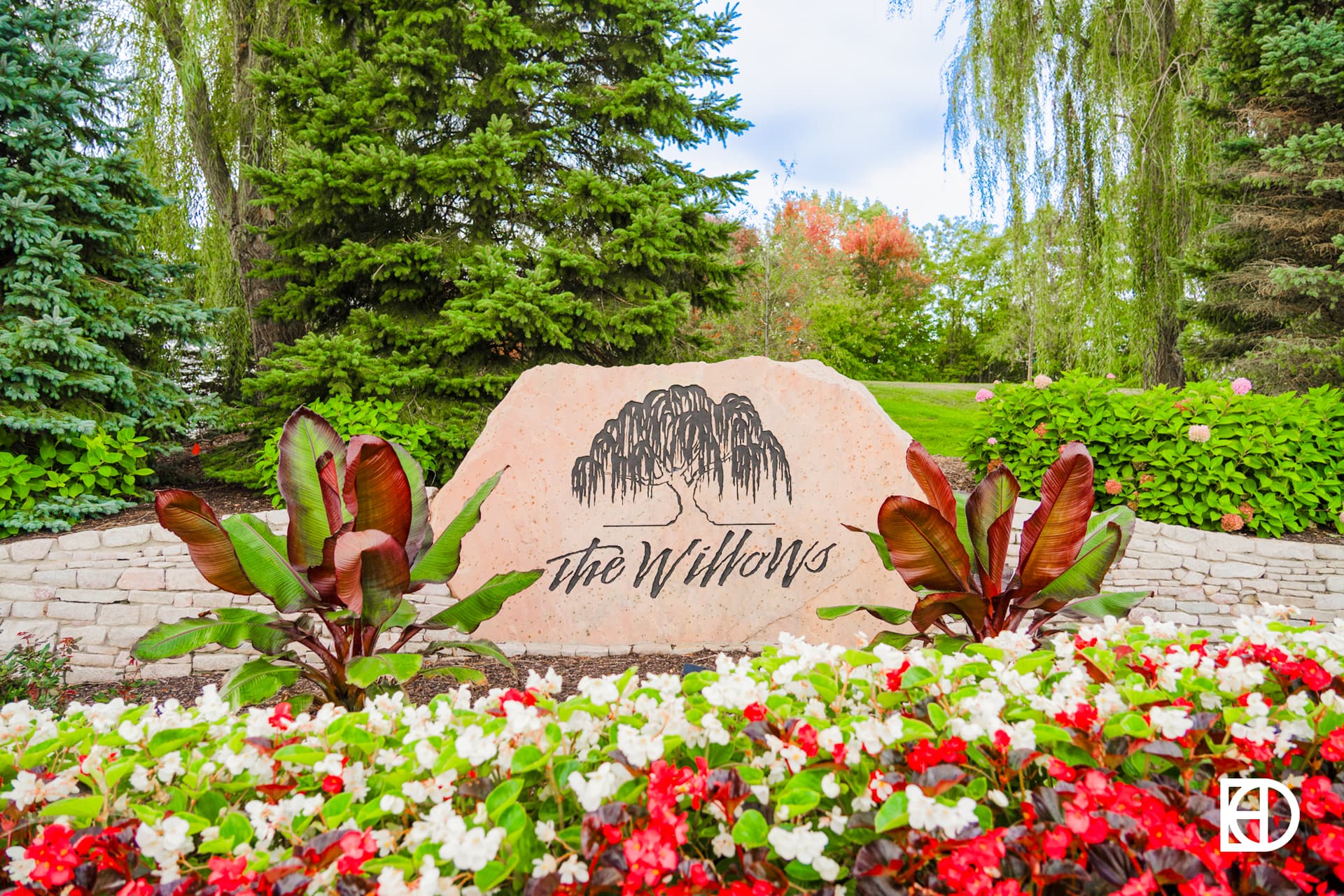 Photo of etched-in-stone entrance sign of The Willows neighborhood in Zionsville, Indiana.
