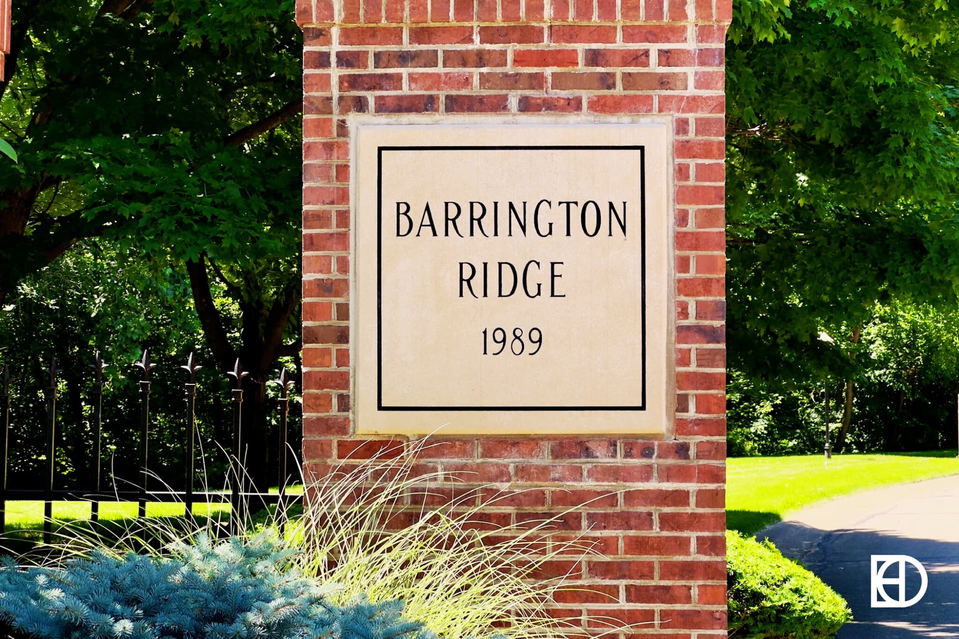 Exterior photo of Barrington Ridge, showing signage and landscaping