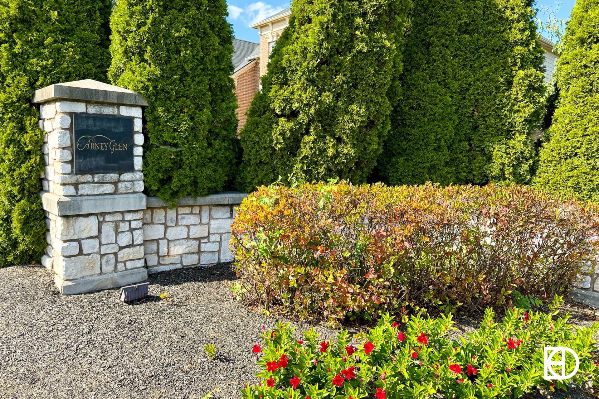 Exterior photo of Abney Glen, showing signage and landscaping