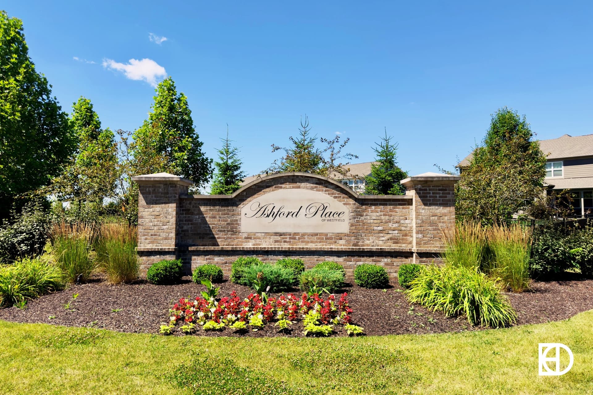 Exterior photo of Ashford Place, showing signage and landscaping