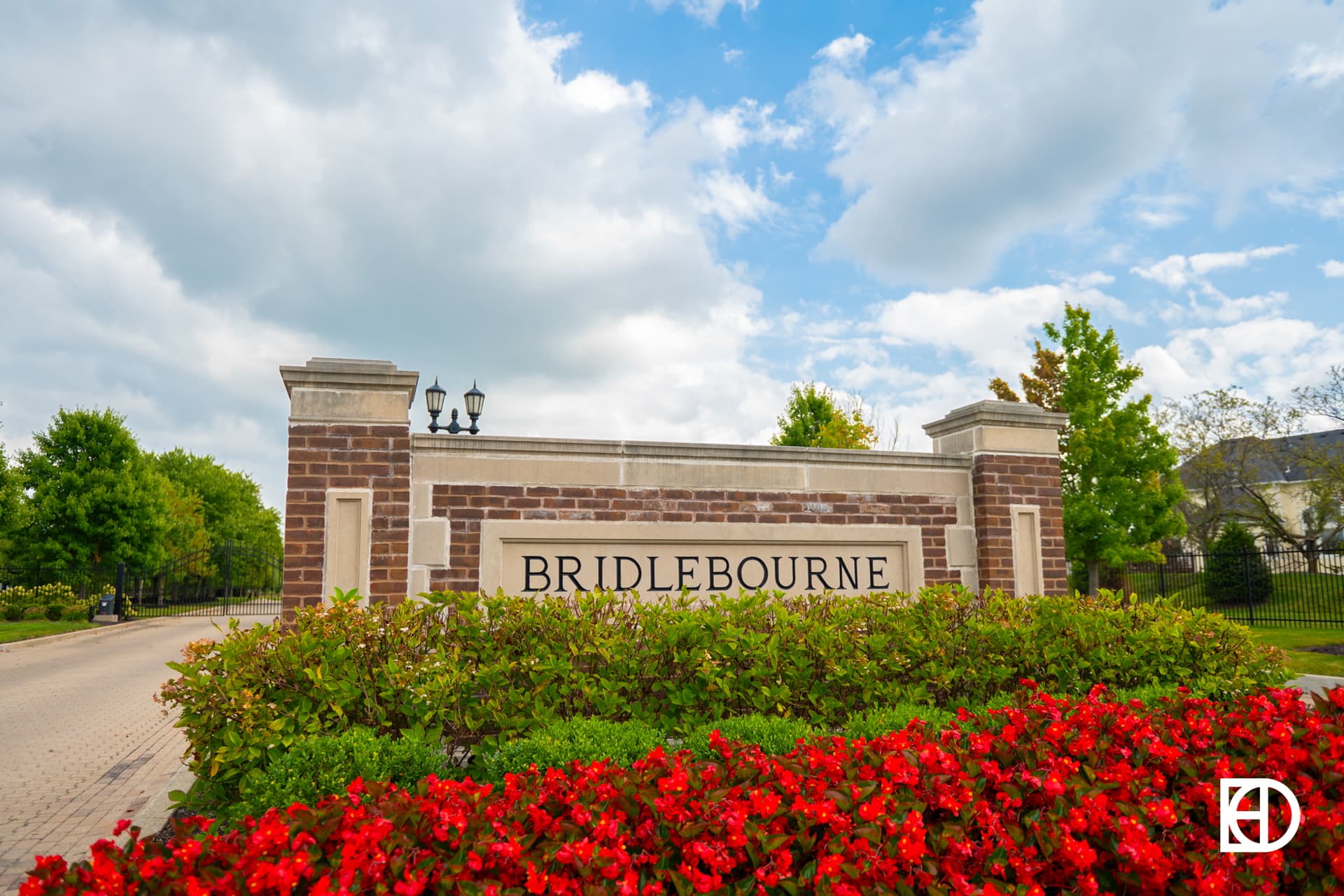 Exterior photo of Bridlebourne, showing signage and landscaping