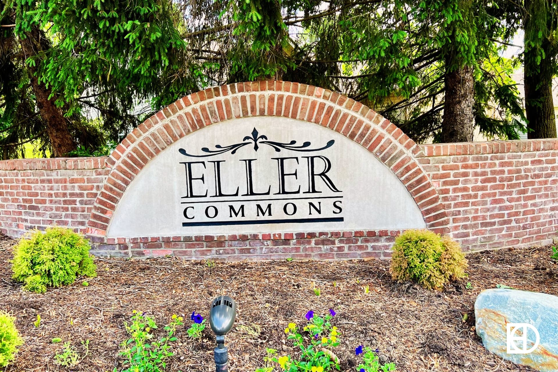 Exterior photo of Eller Commons, showing signage and landscaping