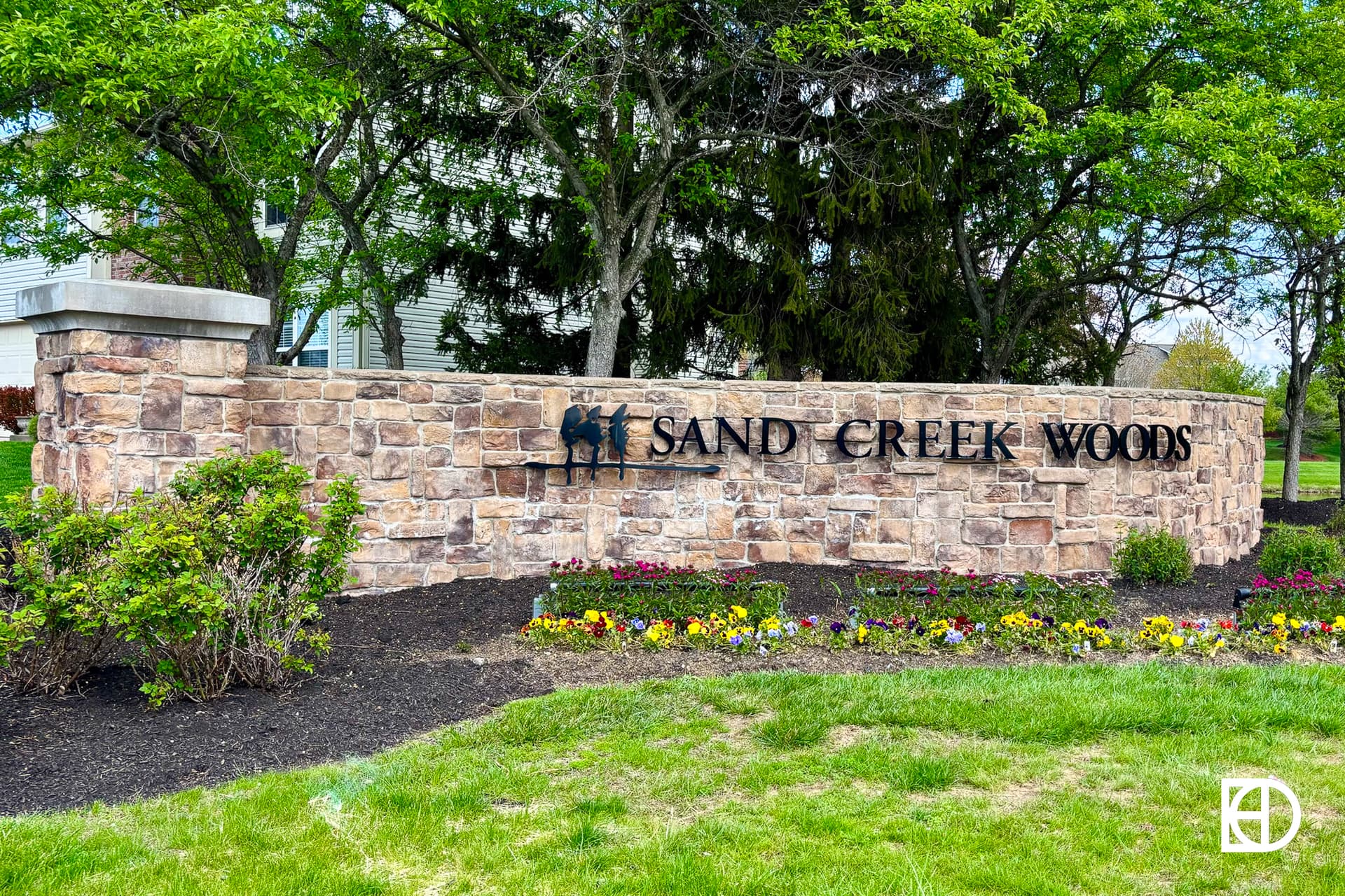 Signage, and landscaping in Sand Creek Woods (Fishers)