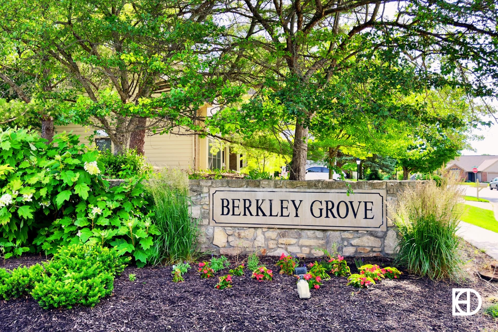 Exterior photo of Berkley Grove, showing signage and landscaping