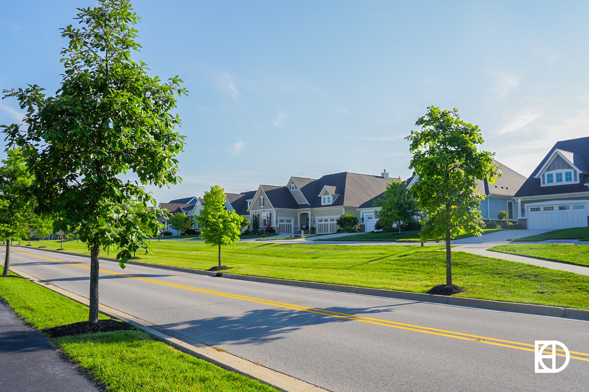 Exterior photo of Legacy, showing roads, homes, and landscaping