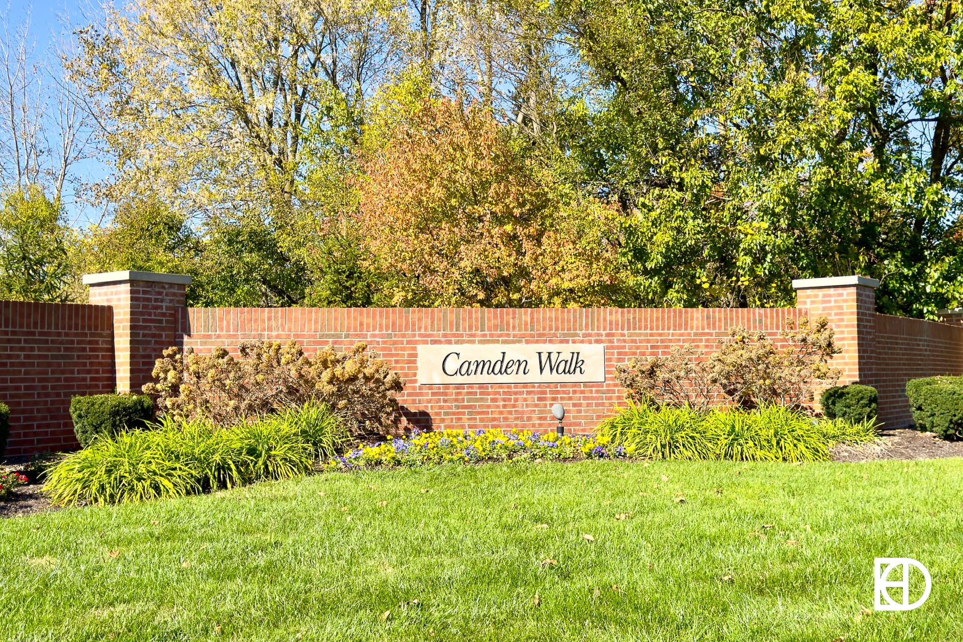 Exterior photo of Camden Walk, showing signage and landscaping