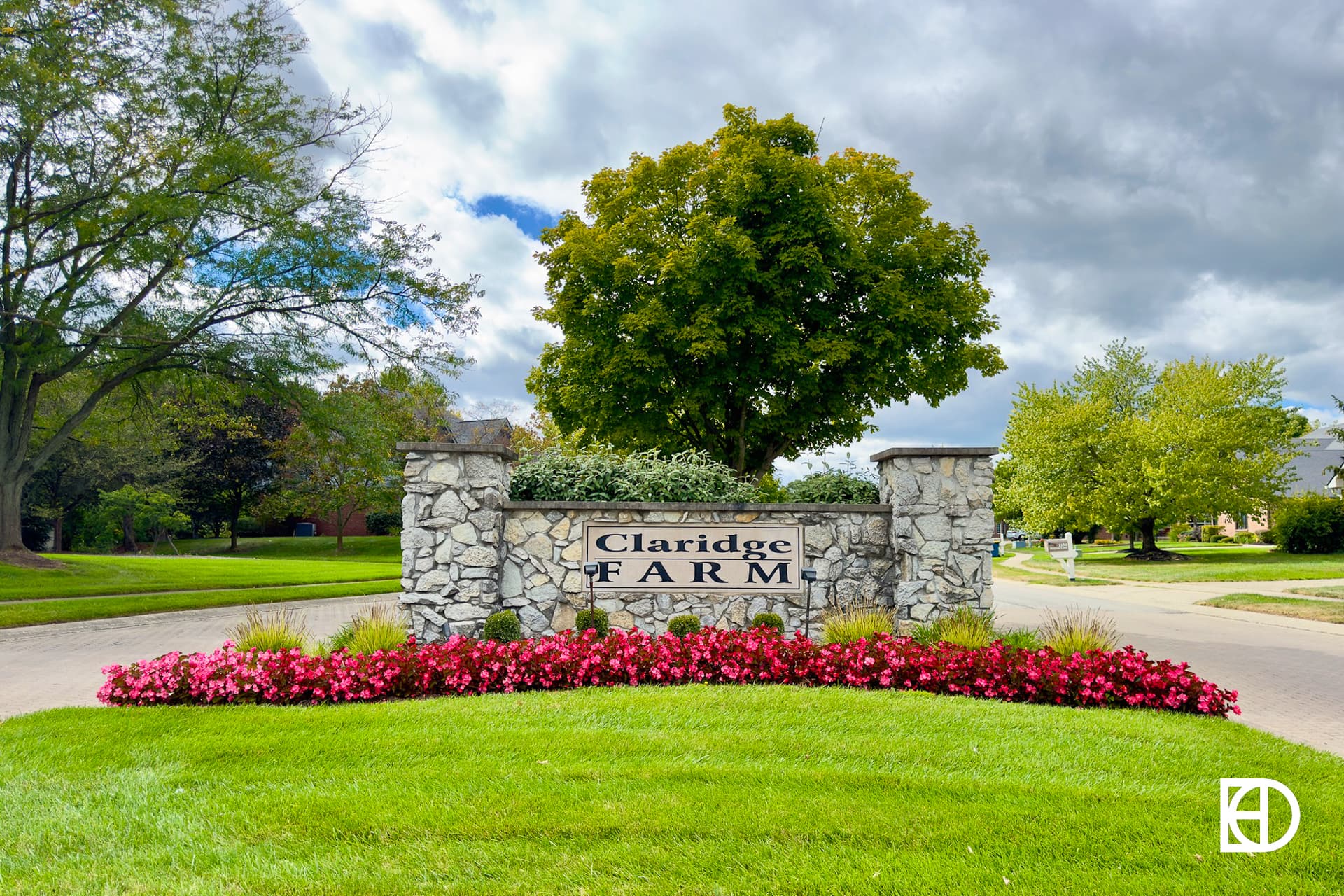 Exterior photo of Claridge Farm, showing signage and landscaping