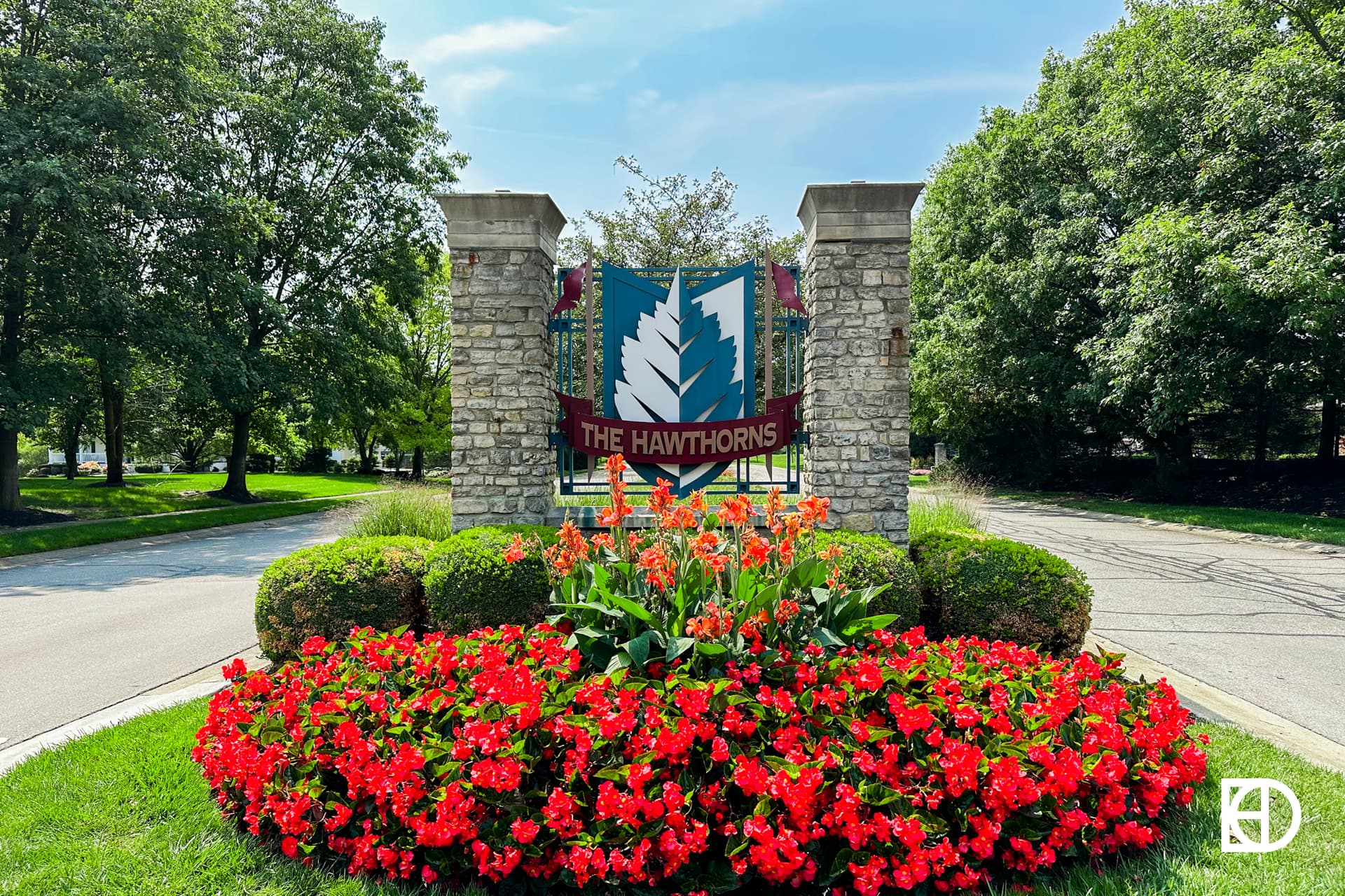 Exterior photo of The Hawthorns, showing signage and landscaping