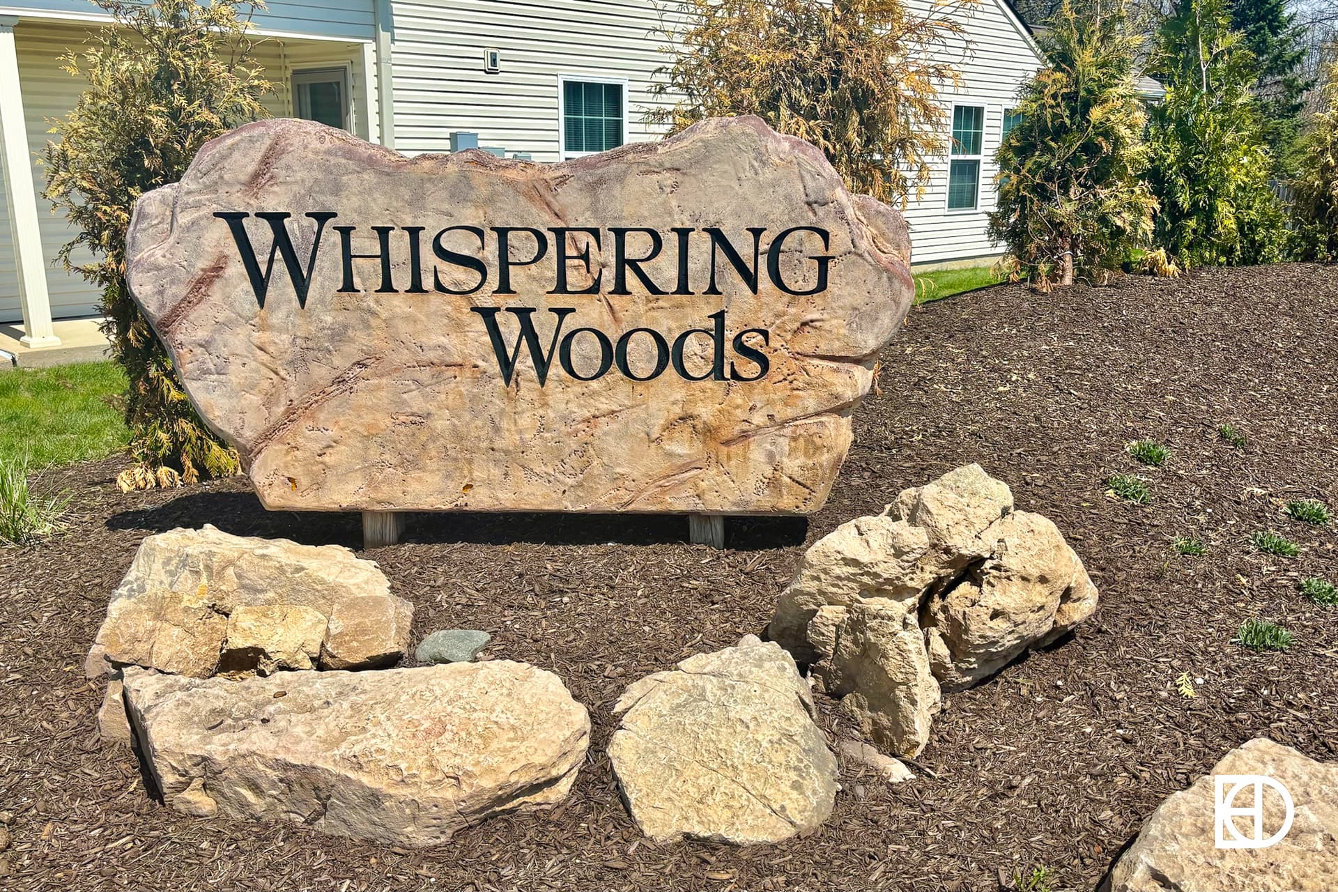 Signage, and landscaping in Whispering Woods (Fishers)