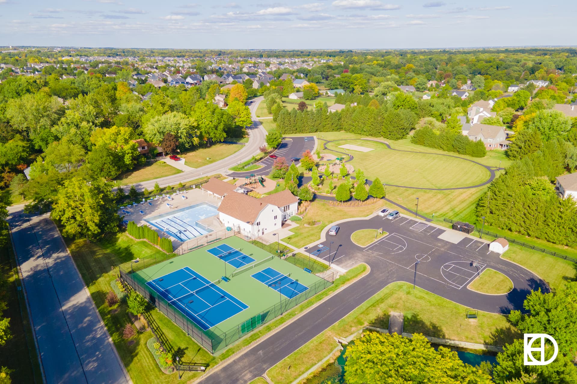 Aerial photo of Village Farms, showing sports fields, greenspace, and landscaping