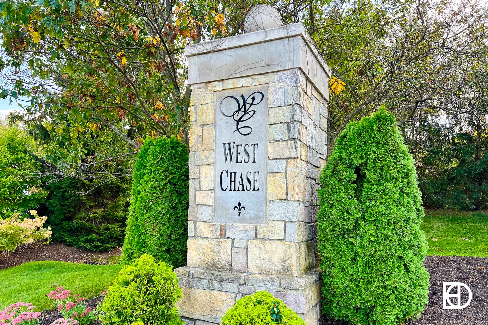Exterior photo of Westchase, showing signage and landscaping