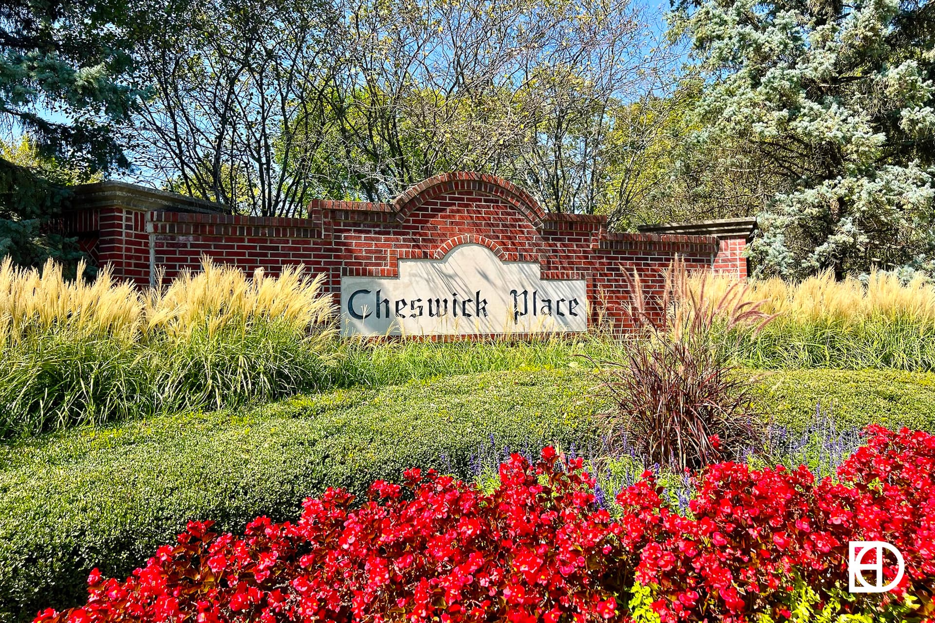 Exterior photo of Cheswick Place, showing signage and landscaping