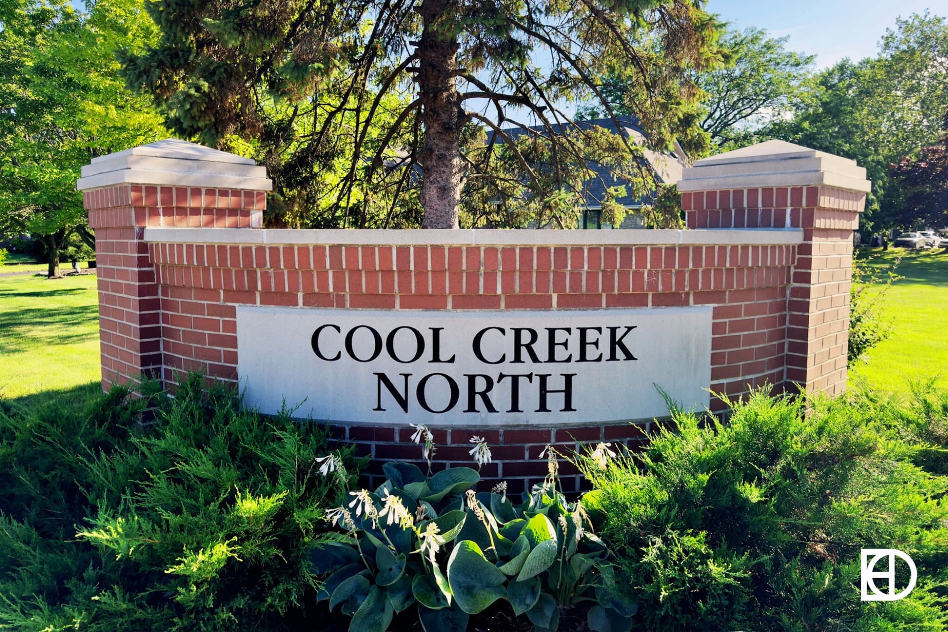 Exterior photo of Cool Creek North, showing signage and landscaping