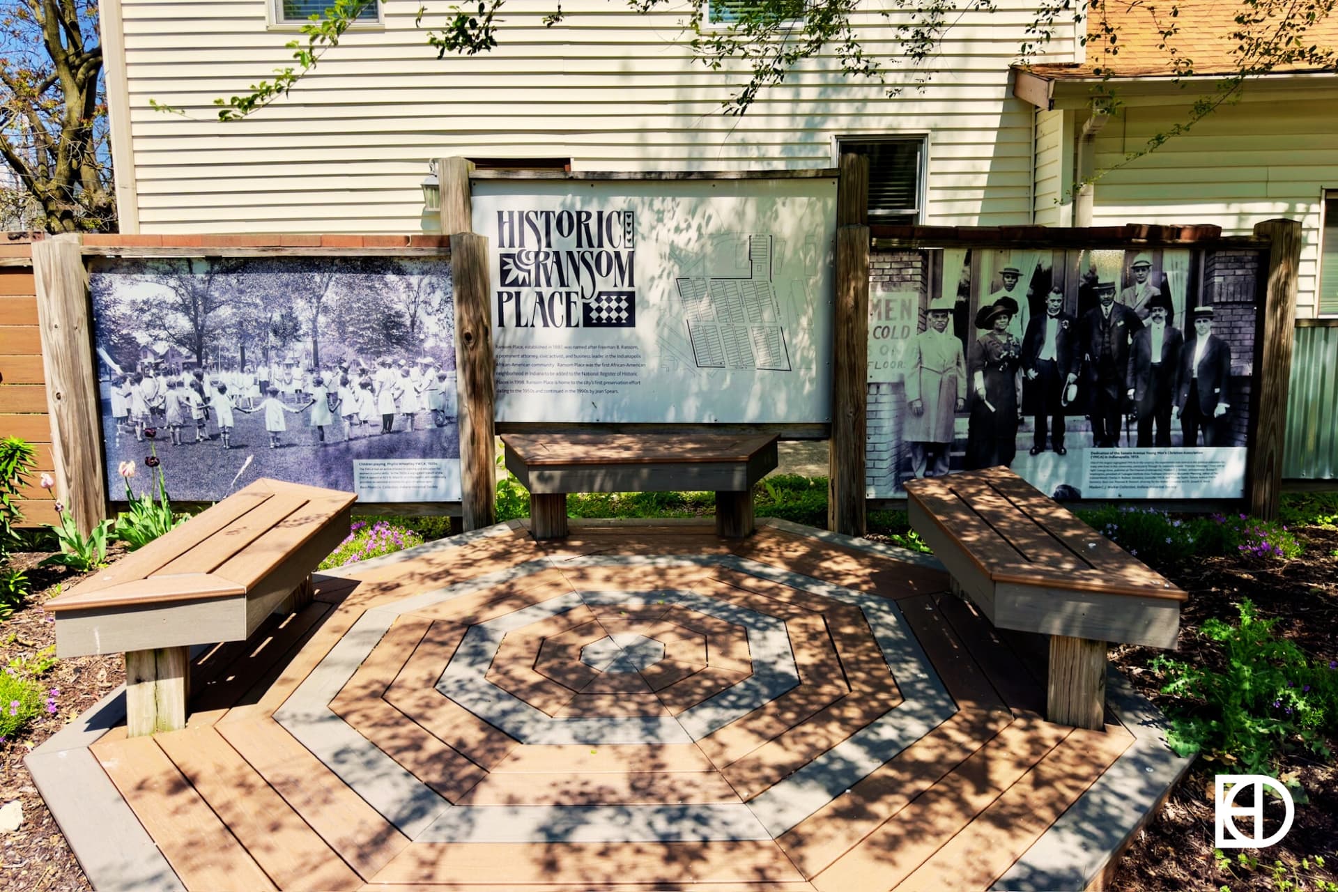 Photo of historical marker and path in Ransom Place Pocket Park