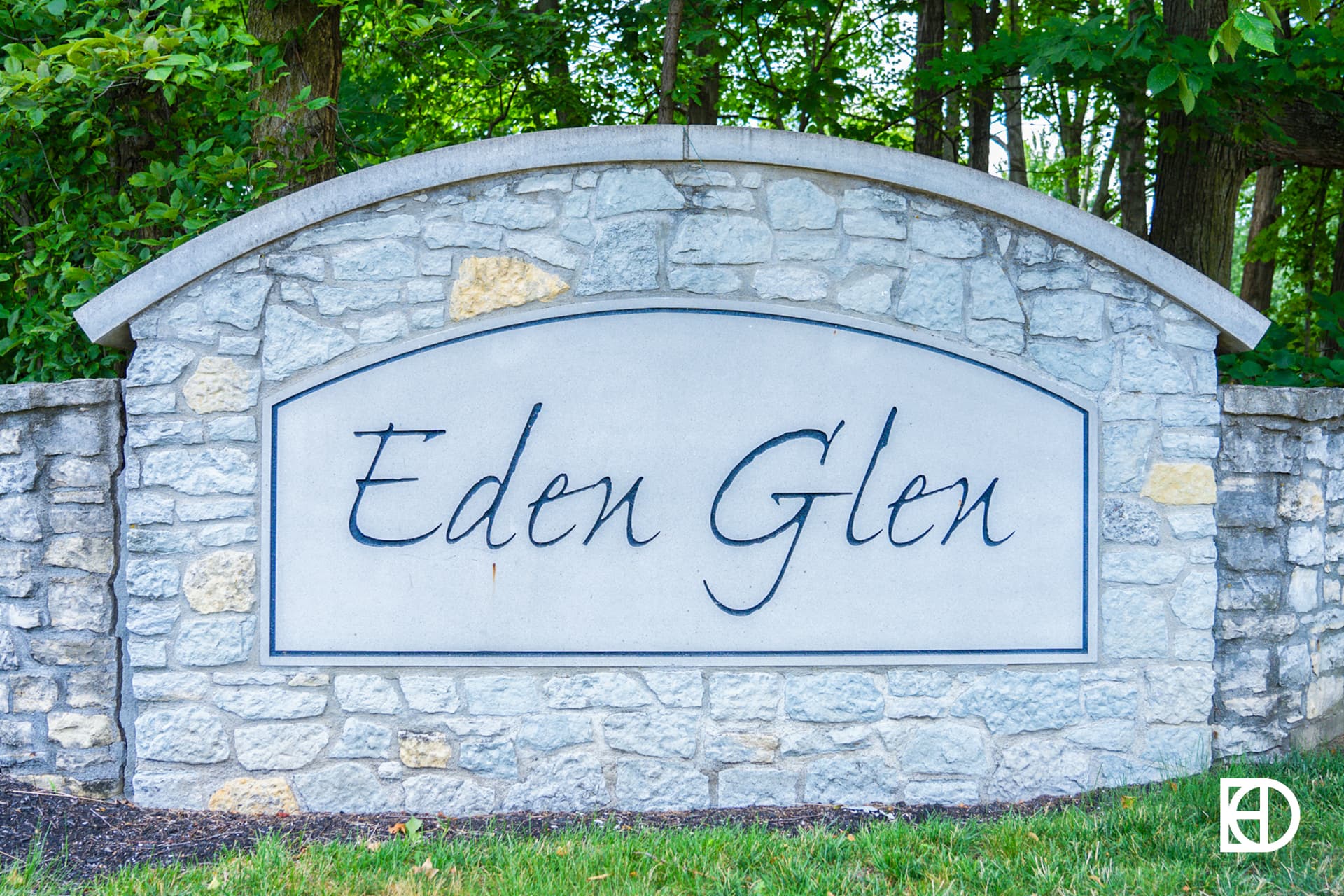 Exterior photo of Eden Glen, showing signage and landscaping