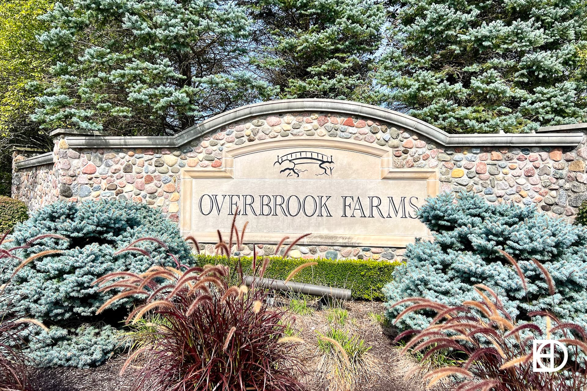 Exterior photo of Overbrook Farms, showing signage and landscaping