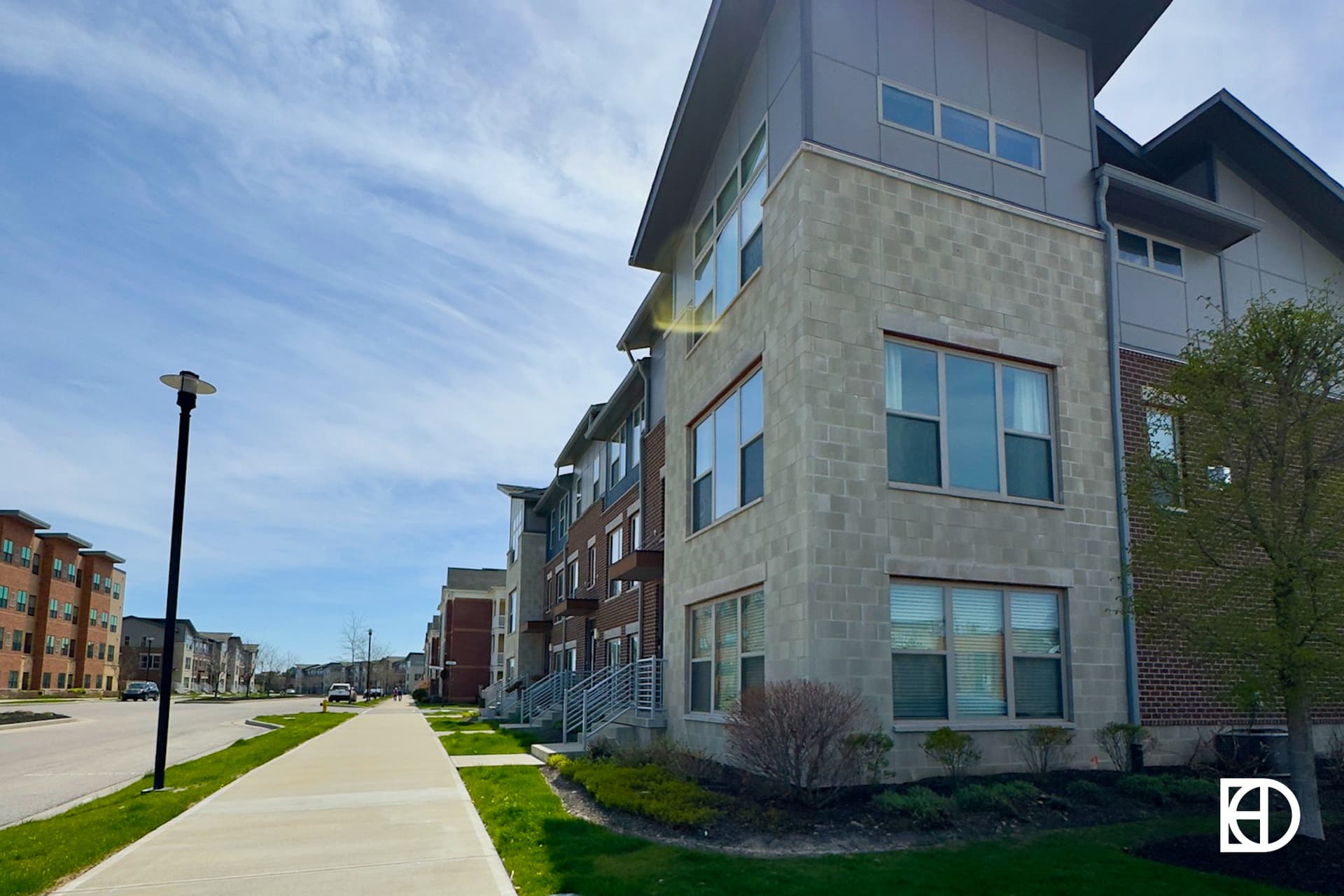 Homes, and walking paths in Central Carmel Townhomes (Grand & Main)