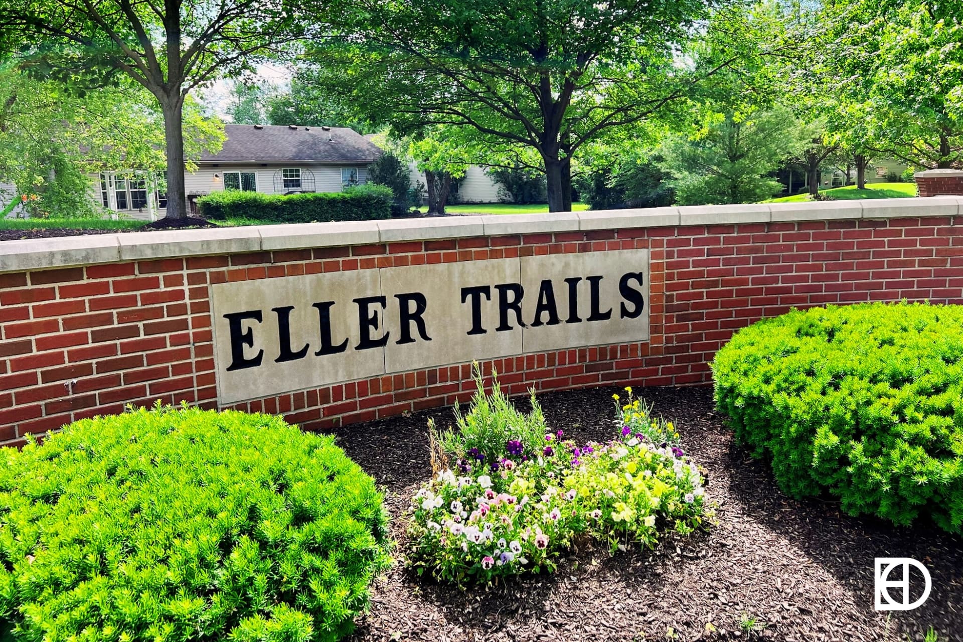 Exterior photo of Eller Trails, showing signage and landscaping