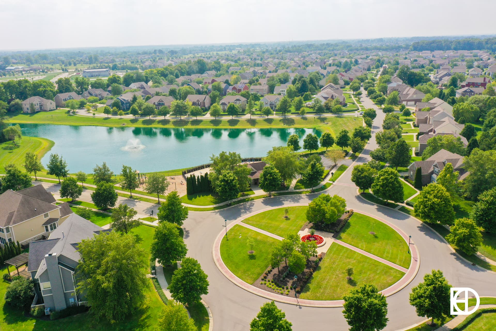 Aerial photo of Saxony, showing pond, landscaping, and streets