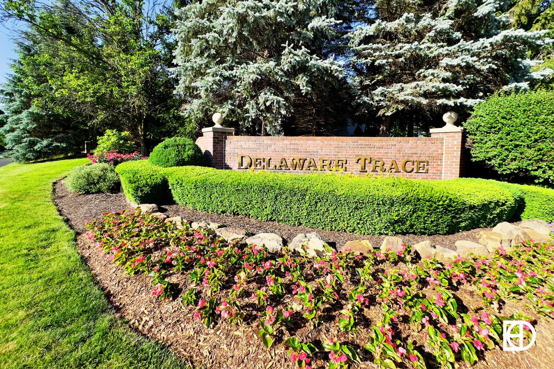 Exterior photo of Delaware Trace, showing signage and landscaping