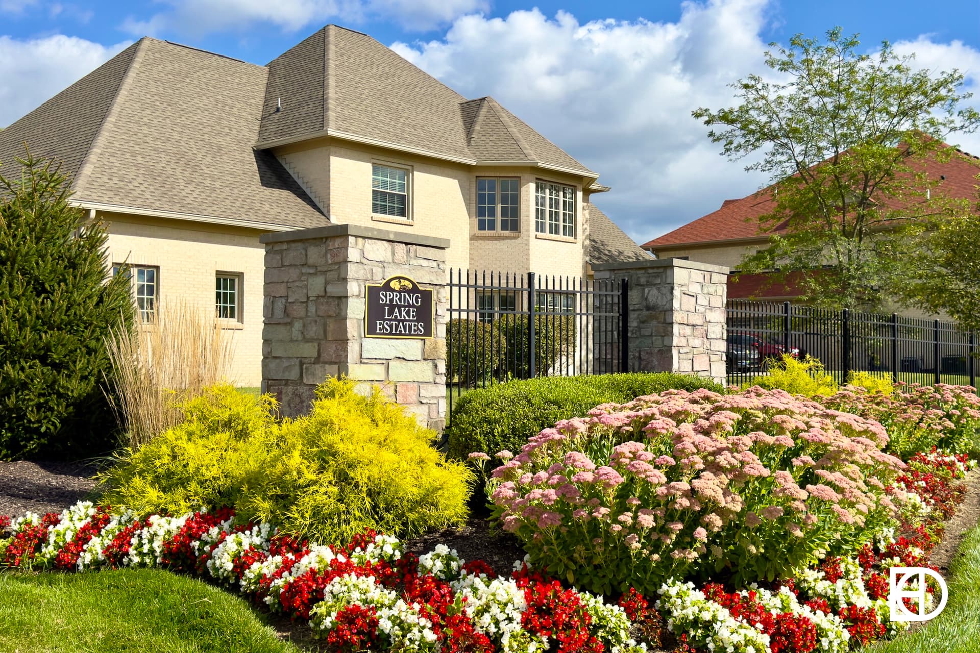 Exterior photo of Spring Lake Estates, showing signage and landscaping