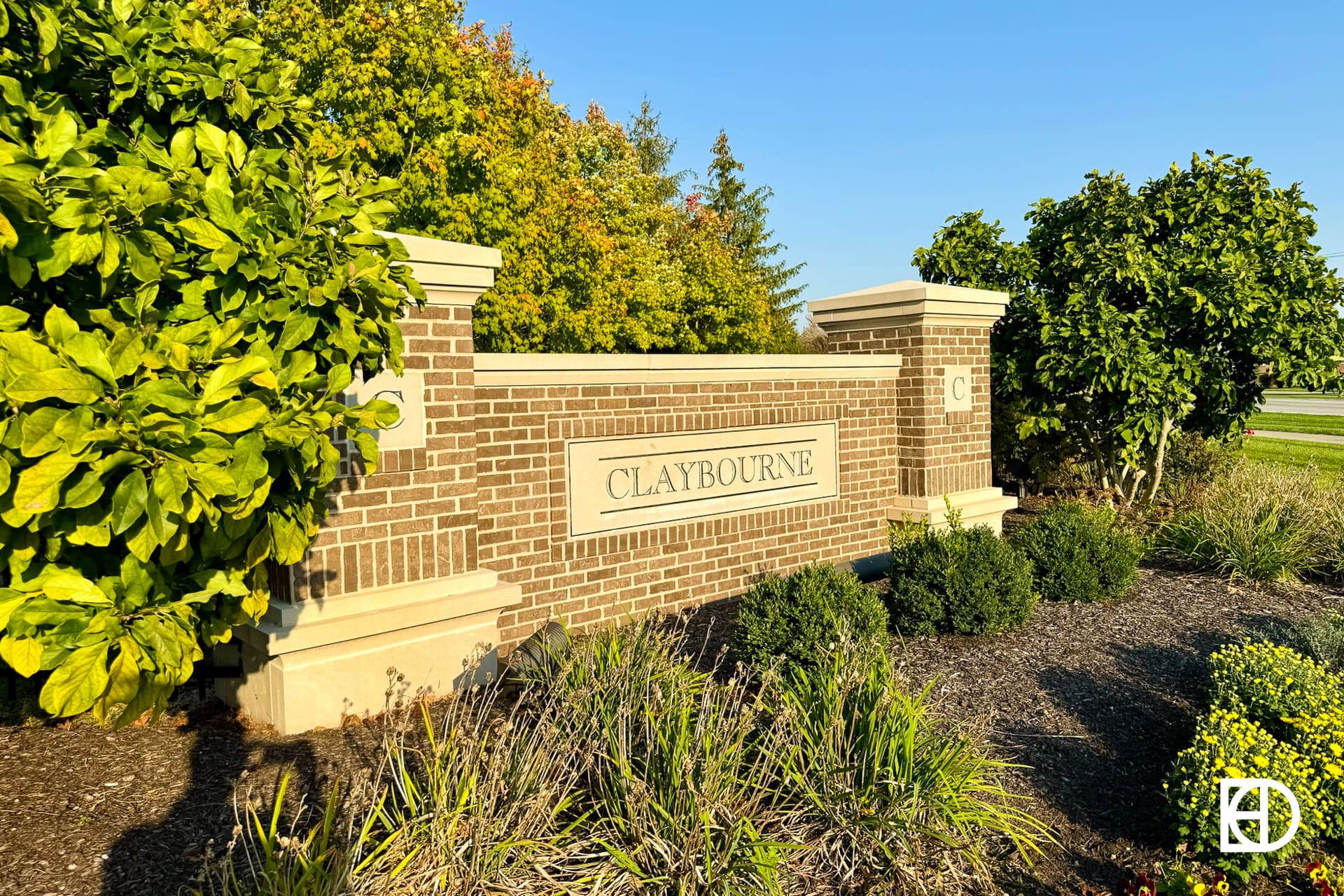 Exterior photo of Claybourne, showing signage and landscaping
