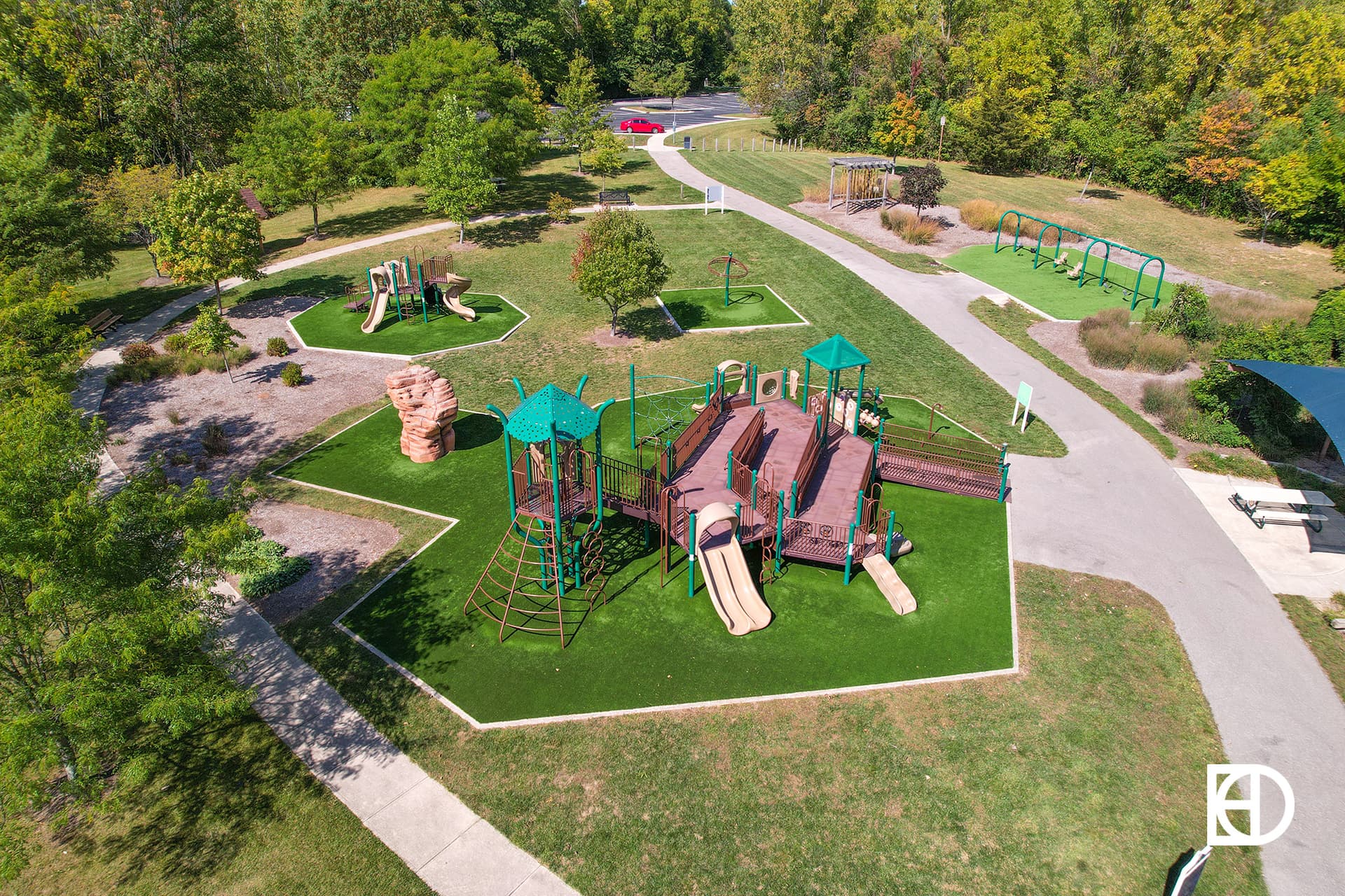 Aerial photo of Freedom Trail Park, showing trees, playground, and green space