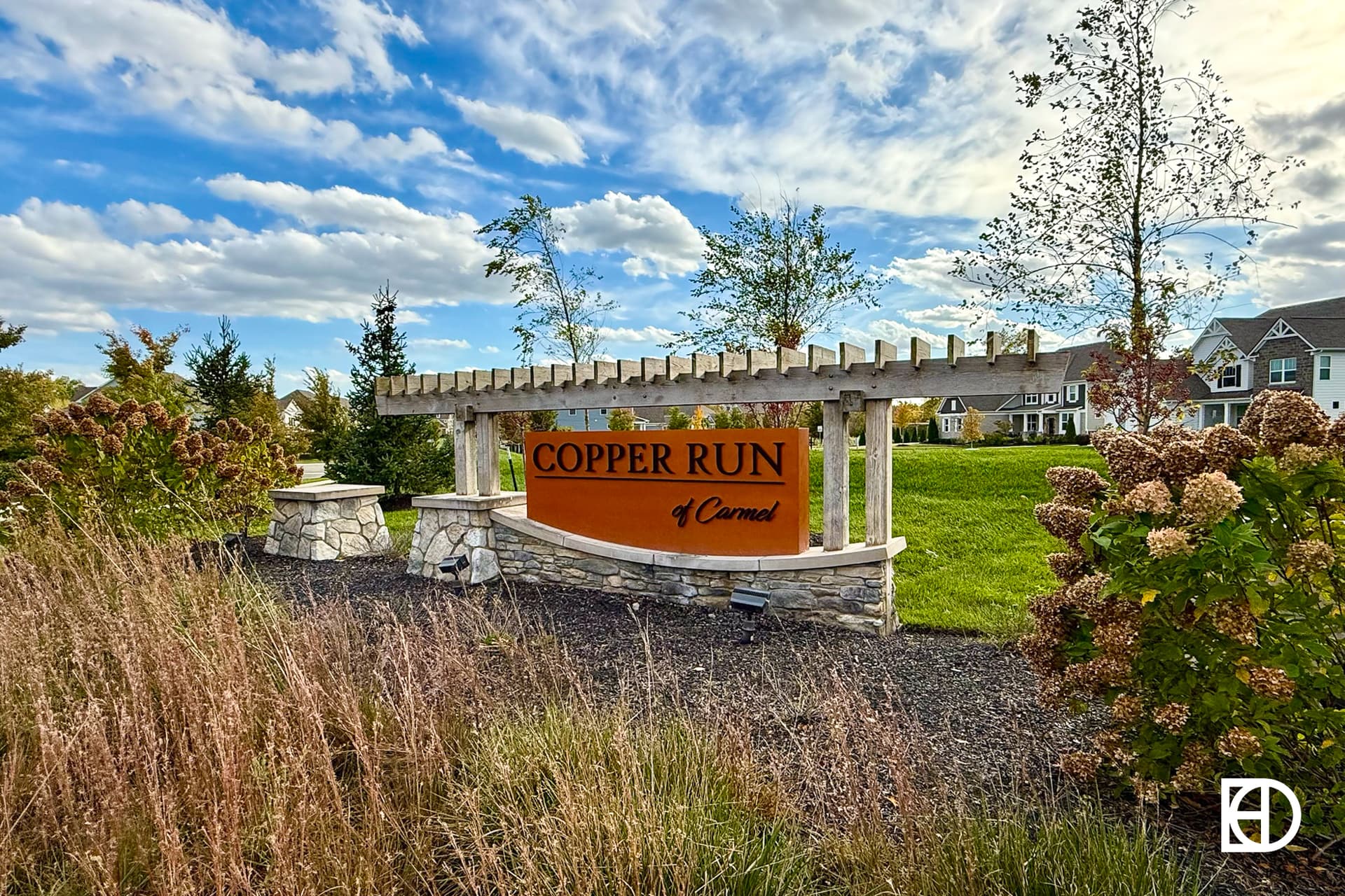 Exterior photo of Copper Run, showing signage and landscaping