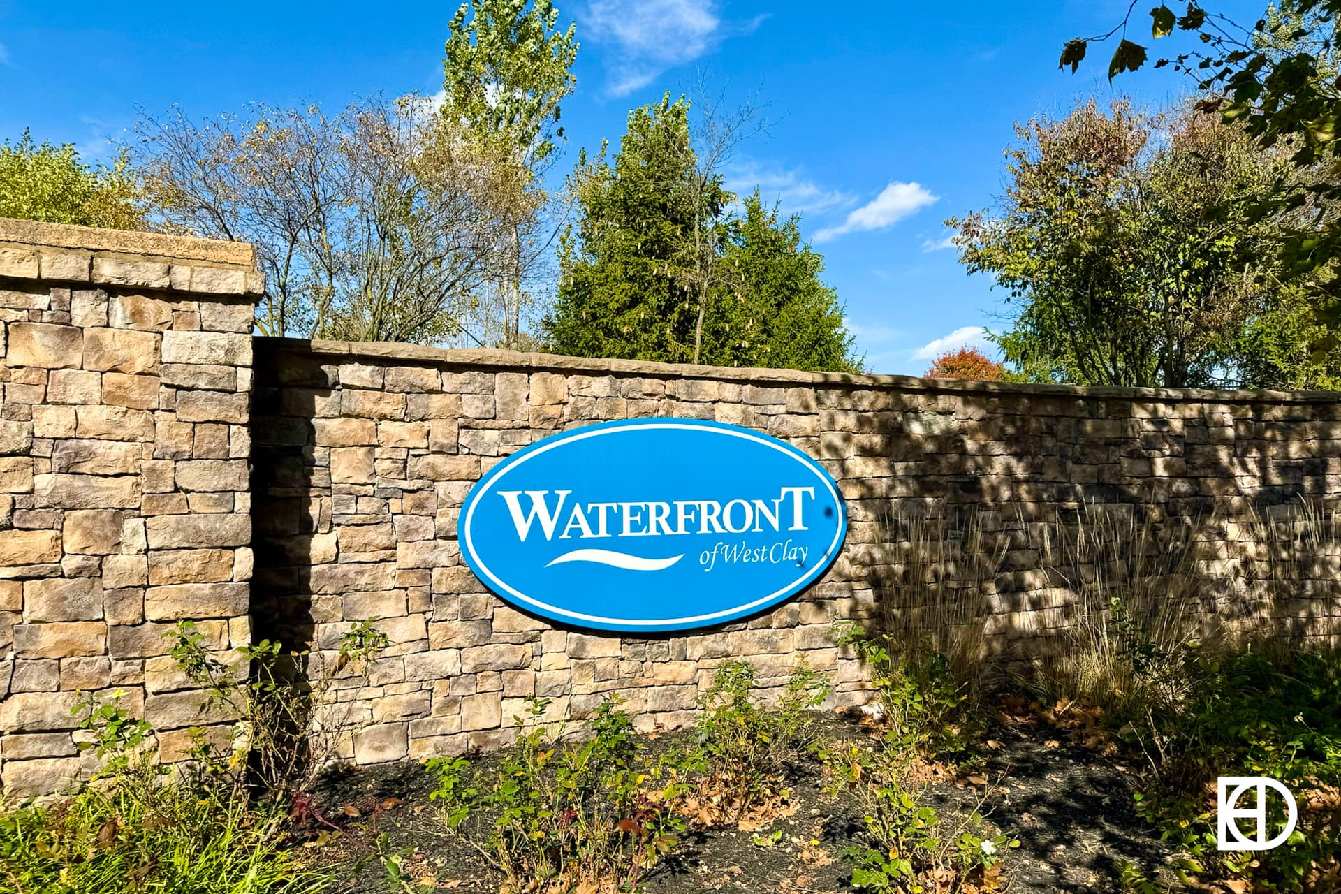 Exterior photo of Waterfront, showing signage and landscaping