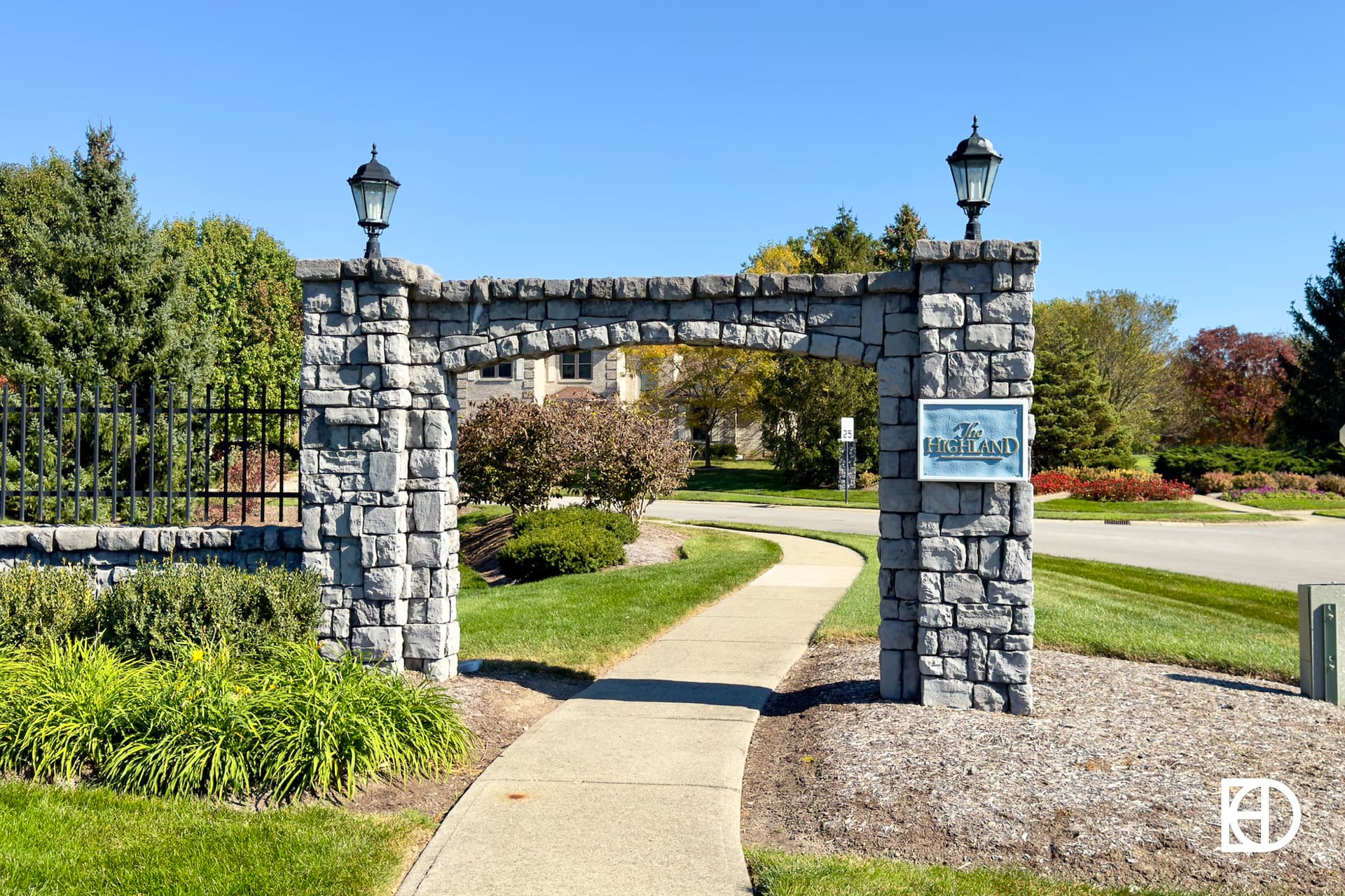 Exterior photo of Shelborne Green, showing signage and landscaping
