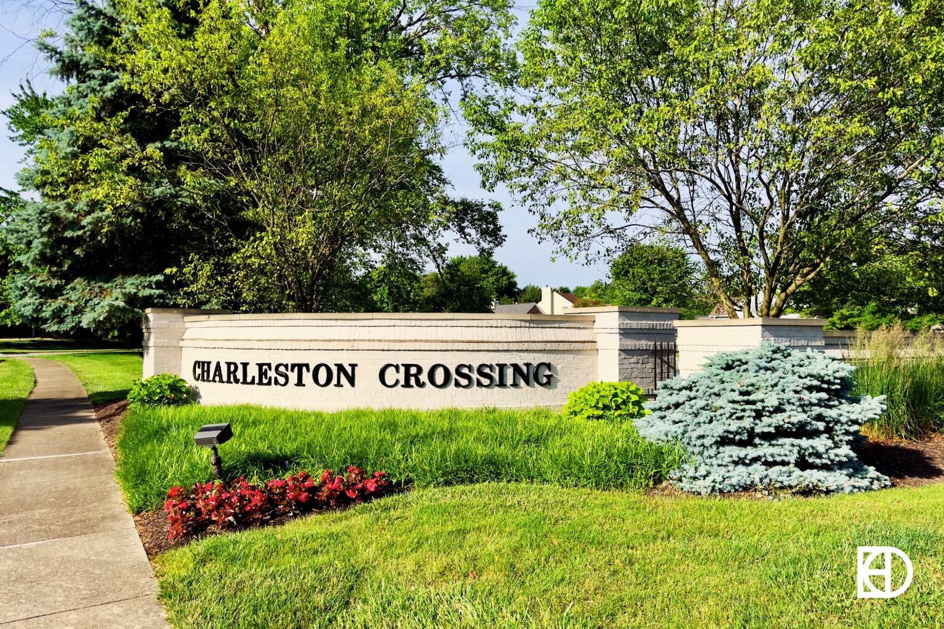 Exterior photo of Charleston Crossing, showing signage and landscaping