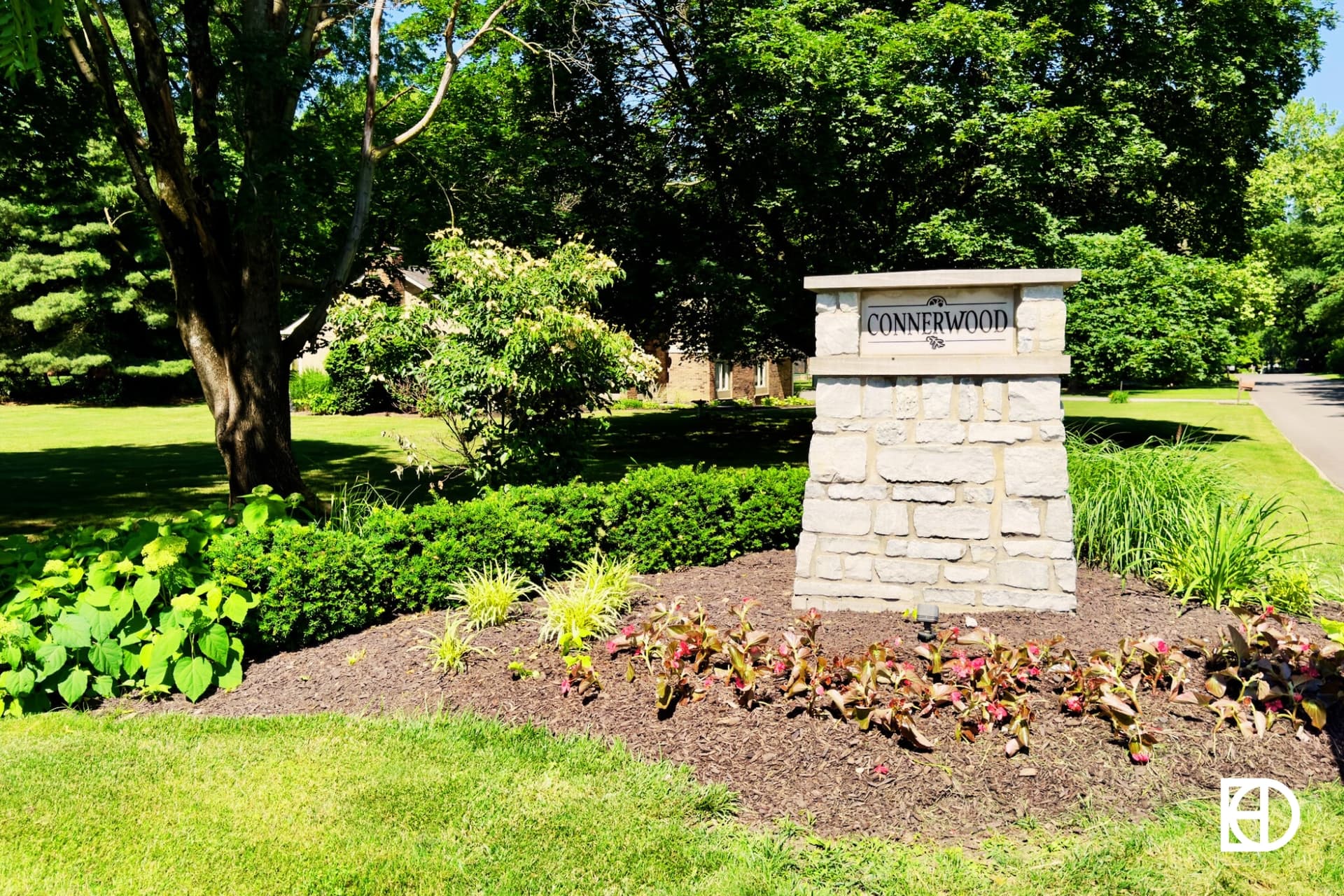 Stone sign and landscaping at the entrance to Connerwood