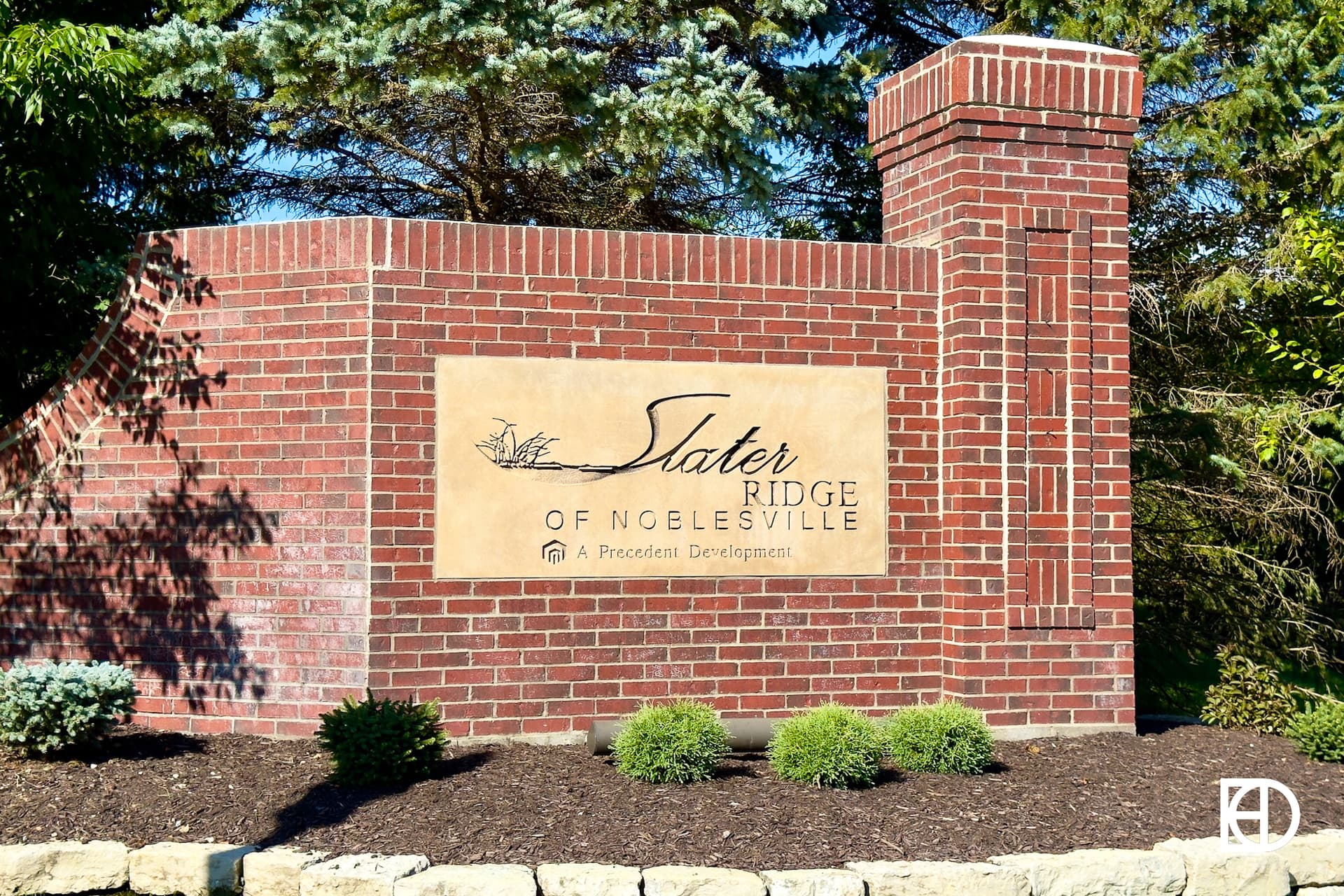 Exterior photo of Slater Ridge, showing signage and landscaping