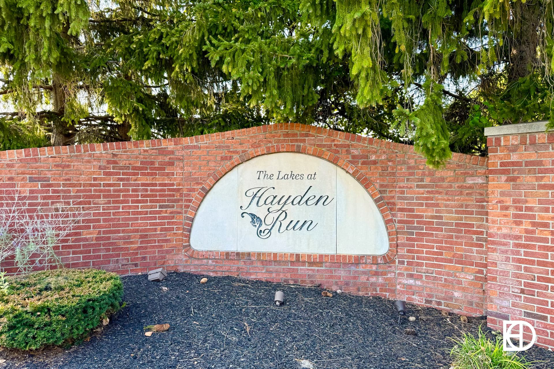 Exterior photo of Lakes at Hayden Run, showing signage and landscaping