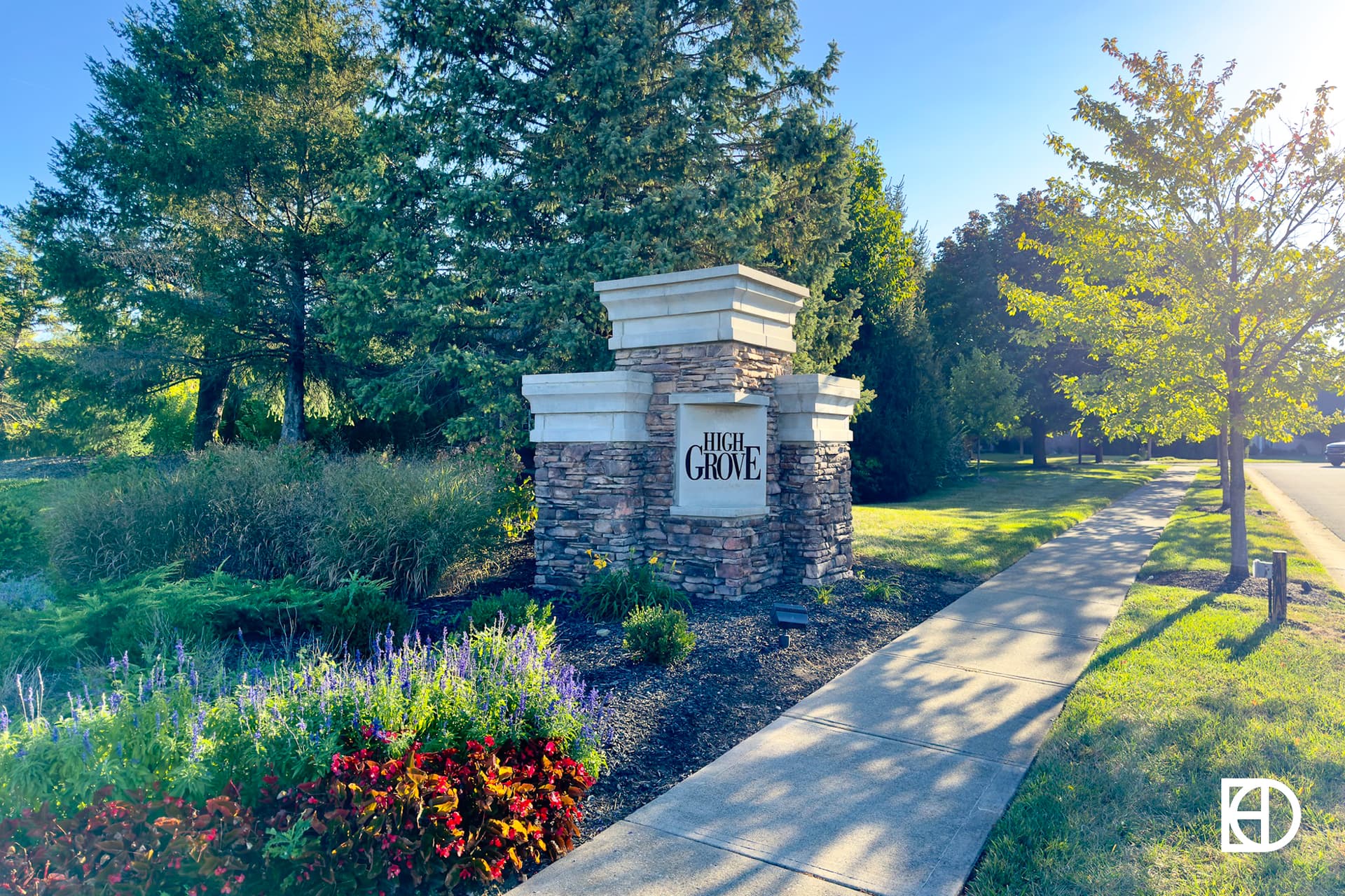 Exterior photo of High Grove, showing signage and landscaping