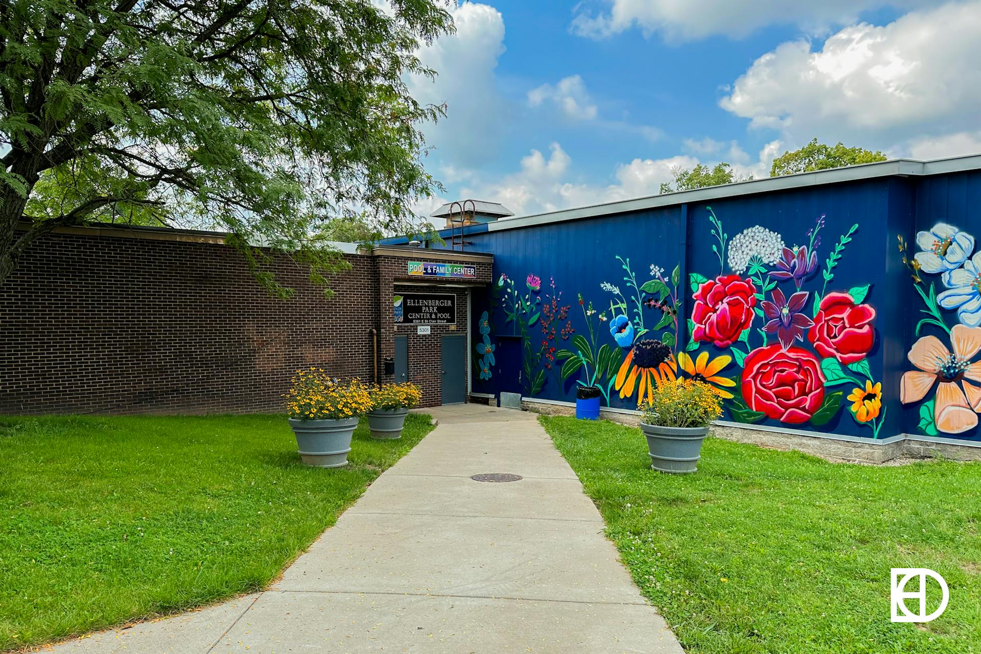 Exterior photo showing a colorful mural of flowers in Ellenberger Park in Irvington