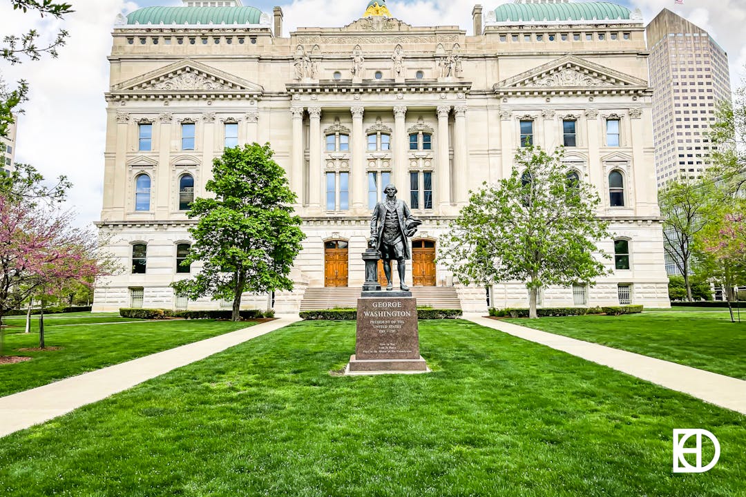 Photo of George Washington statue located on lawn of Indiana State Capitol.