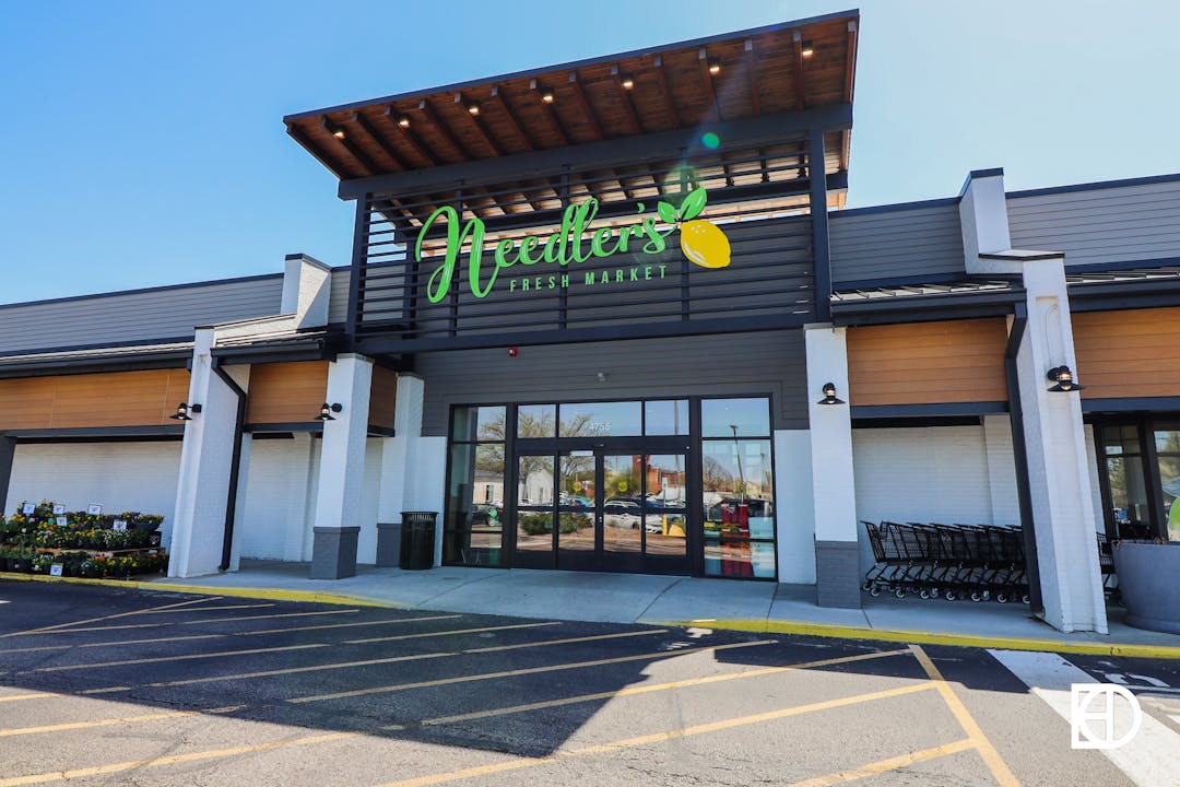 Exterior photo of sign and entrance to Needler's Fresh Market.