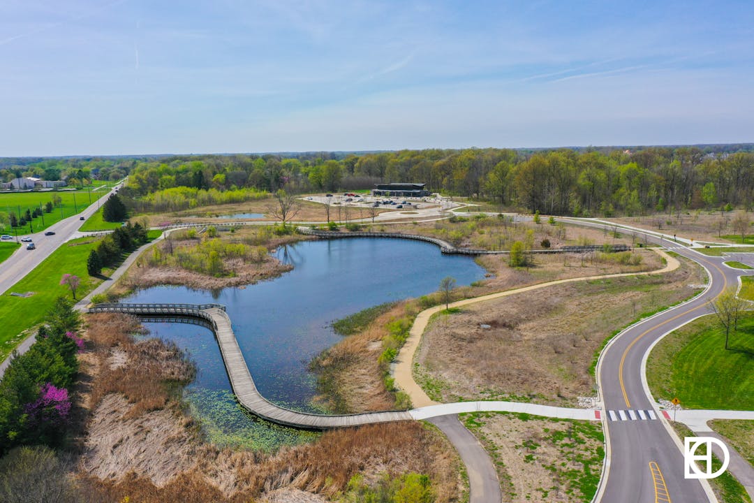 Aerial view of West Park looking west, over pond and Jill Perelman Pavilion. 