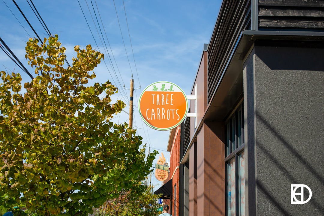 Photo of exterior signage of Three Carrots in Fountain Square