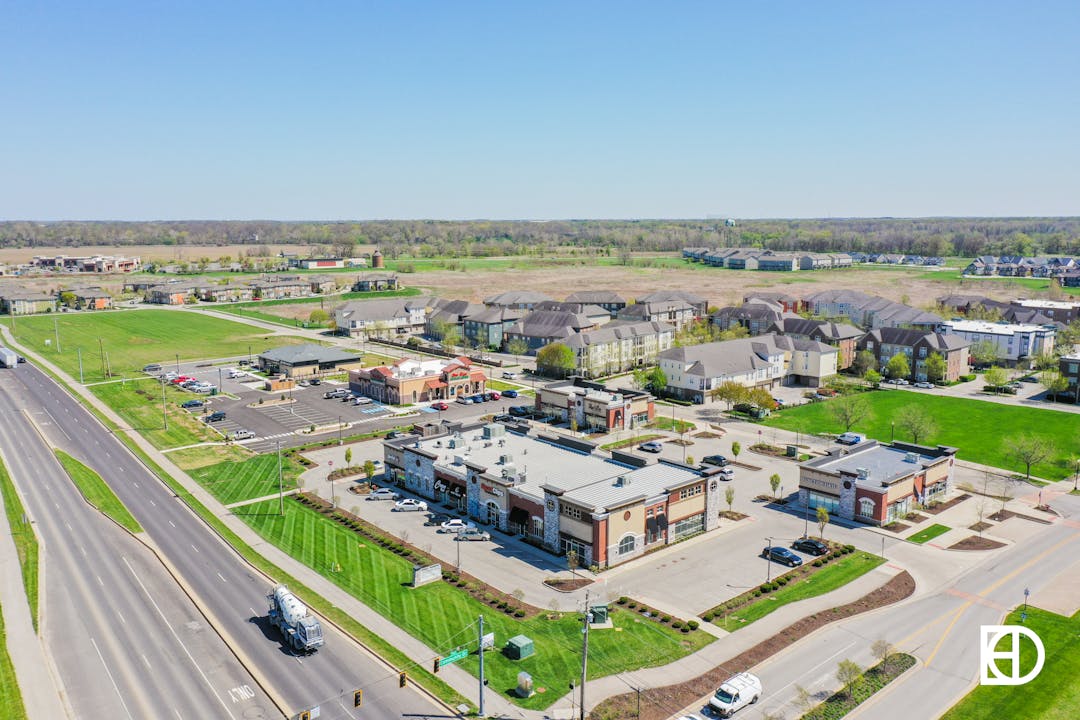 Aerial view of the Legacy area of Carmel with shops, homes and apartments.