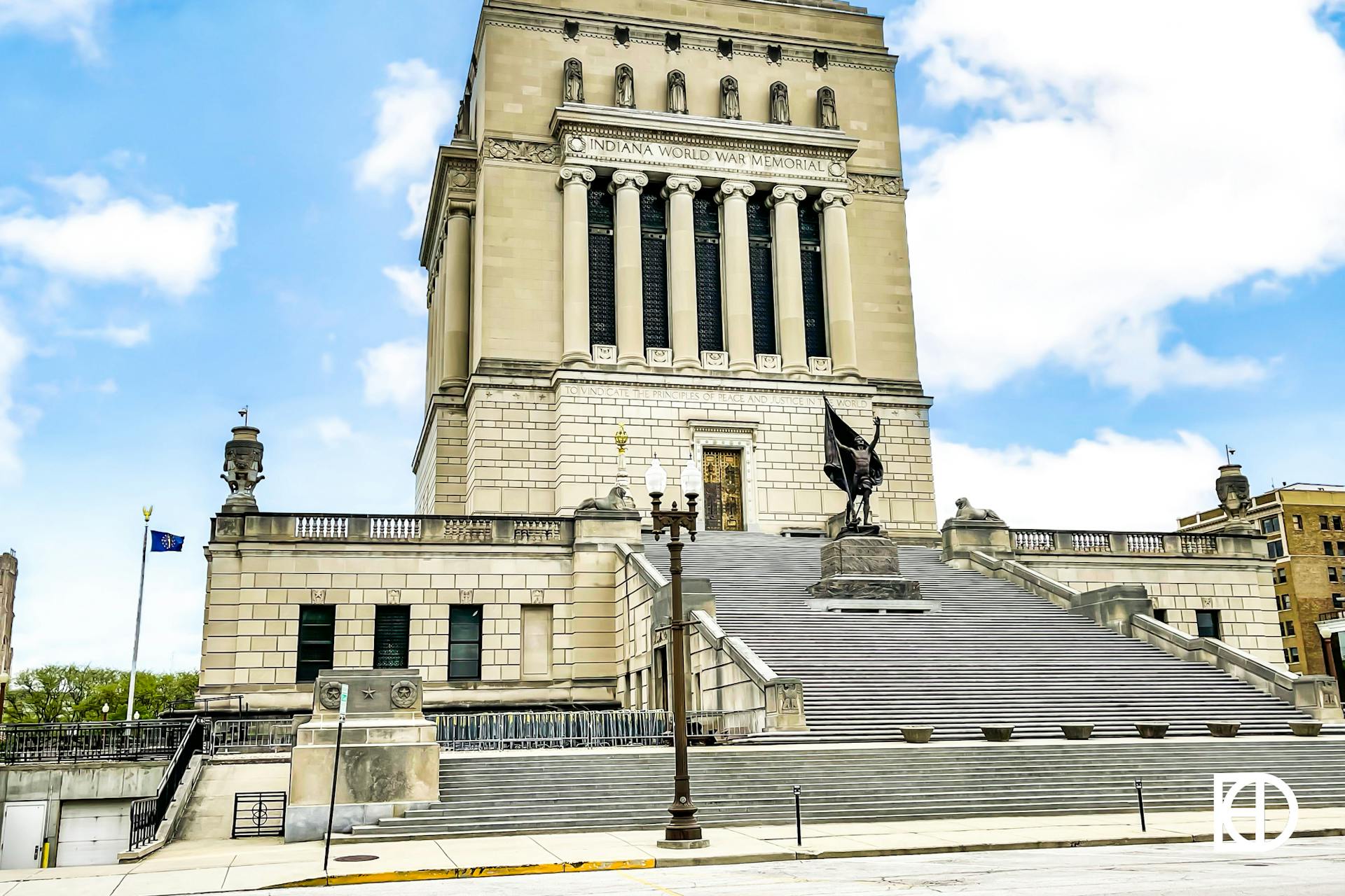 Exterior photo of entrance and statue outside of Indiana World War Memorial.