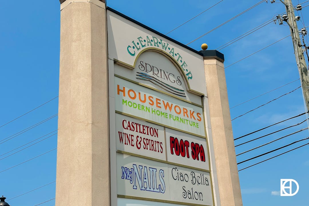 Photo of Clearwater Springs Shopping Center signage, showing Houseworks, Foot Spa, etc