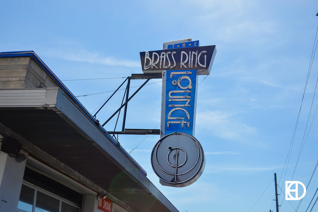 Photo of the exterior signage of The Brass Ring